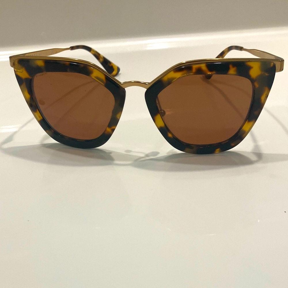 Gold Prada Sunglasses.